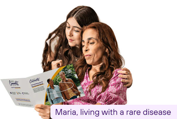 Maria, living with a rare disease, reads a Vertex Connects brochure.